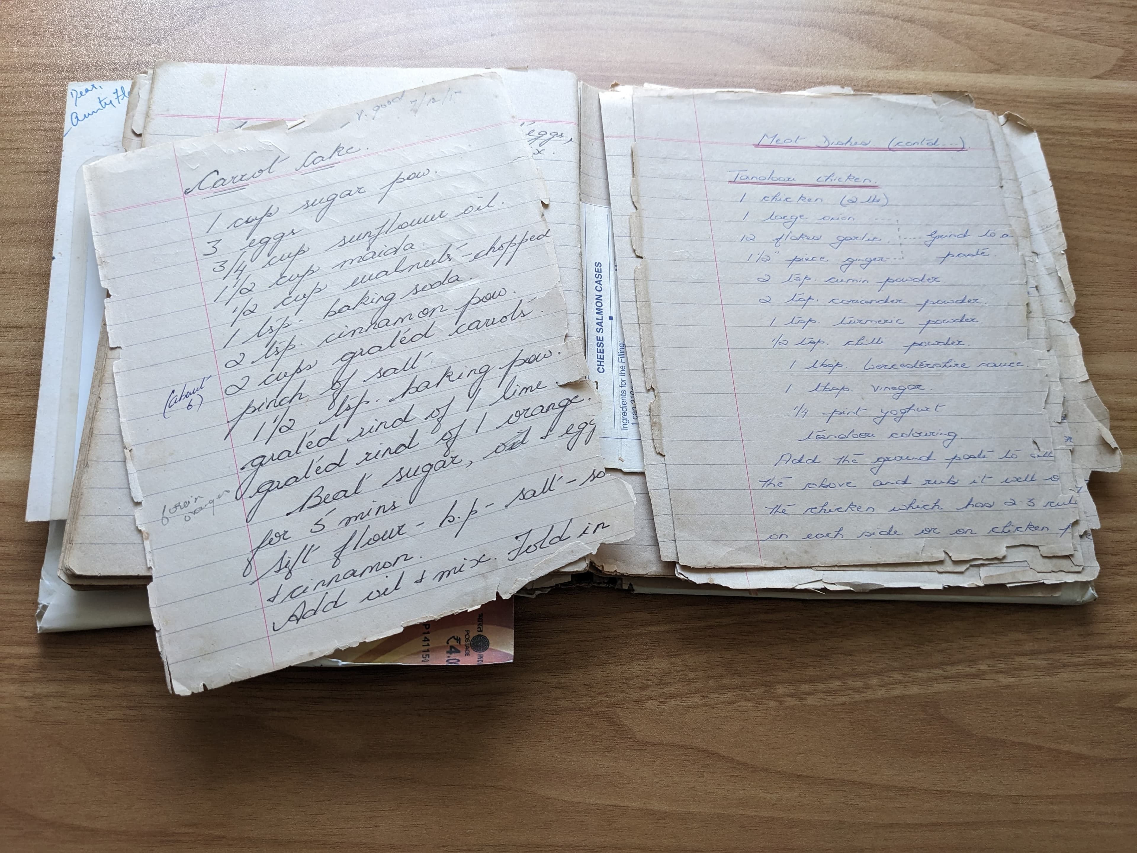 Family recipe book with handwritten recipes and family photos